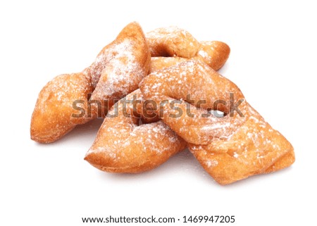 Bugnes, french regional specialty of donuts isolated on white background