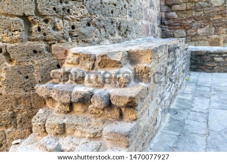Stone masonry, weathered by time, ancient fortress buildings
