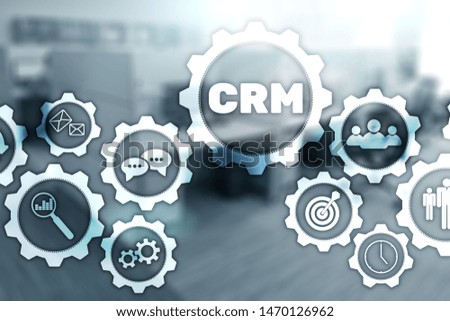 CRM Customer Management Analysis Service Concept. Graphics on blurred office background.