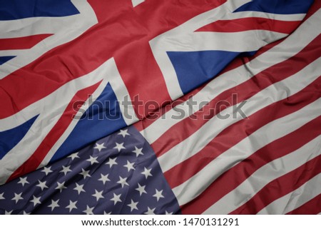 waving colorful flag of united states of america and national flag of great britain. Royalty-Free Stock Photo #1470131291