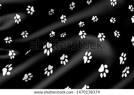 Animal paw prints on fabric. Abstract background with traces of the beast. 