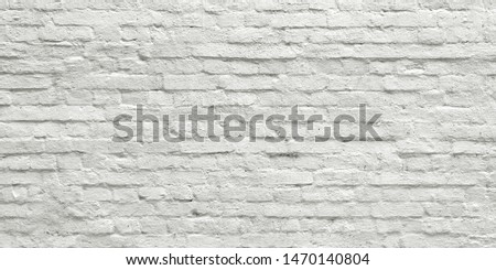 White Rustic Texture. Retro Whitewashed Old Brick Wall Surface. Vintage Structure. Grungy Shabby Uneven Painted Plaster. Whiten Facade Background. Design Element. Abstract Light White Web Banner.