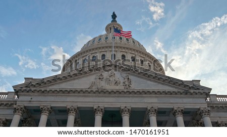 Hero shot of the United States of America (US) National Capitol Building in the Nation's capital, Washington, District of Columbia (DC.) This landmark is located in the Capitol Hill / National Mall. Royalty-Free Stock Photo #1470161951