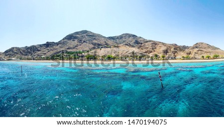 View of the coral reef and mountains of the Red Sea. Eilat, Israel.