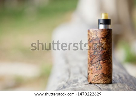 high end natural stabilized wood box mods with rebuildable dripping atomizer, vaping device, selective focus