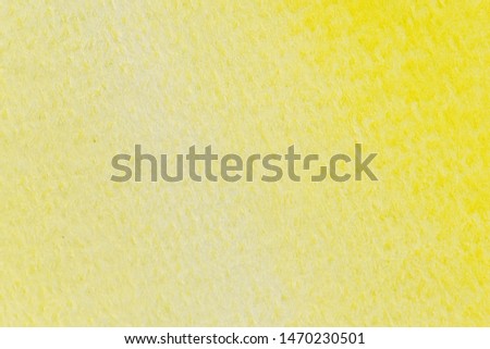 Abstract yellow watercolor painting textured on white paper background