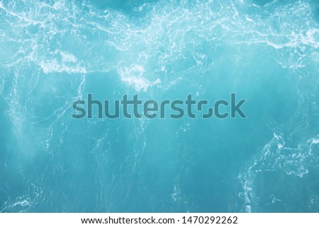 Sea  Waves in ocean wave Splashing Ripple Water. Blue water background. Leave space for writing messages.