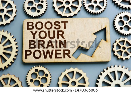 Boost your brain power sign on wooden plate. Royalty-Free Stock Photo #1470366806