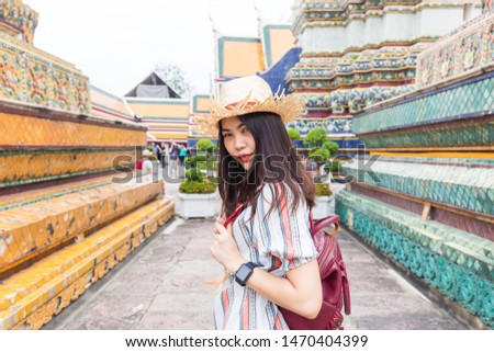 Asian beautiful tourist women walking travel in buddhist temple sightseeing in Bangkok, Thailand