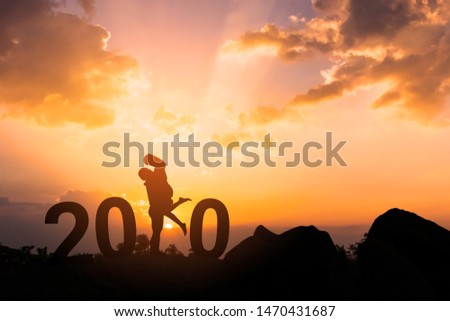 Happy New Year 2020,Silhouette young couple Happy for romantic new year concept,copy space for text.
