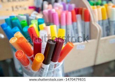 stack of coloured felt-tips at market store. selective focus. education and stationery concept. back to school concept.