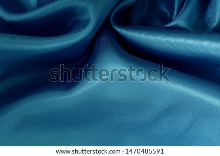Blue fabric cloth texture for background and design art work, beautiful pattern of silk or linen.