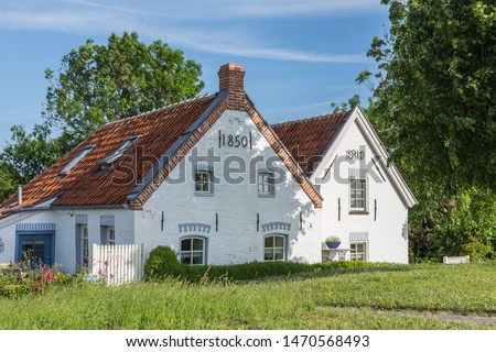 Historic Houses in Romantic Fishing Village Greetsiel, North Sea, East Frisia, Germany   Royalty-Free Stock Photo #1470568493