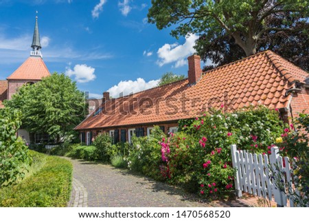 The village of Rysum, a typical "Rundwarfendorf" in East Frisia near Emden Royalty-Free Stock Photo #1470568520
