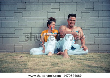Asian couple enjoy body paint