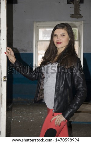 brunette girl in an abandoned building