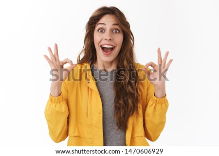 Supportive girlfriend fascinated awesome game encourage friend approve cheer show okay ok excellent gesture smiling broadly compliments cool choice standing excited upbeat white background