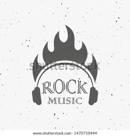 Headphones fire and text. Black and white illustration on the theme of rock music