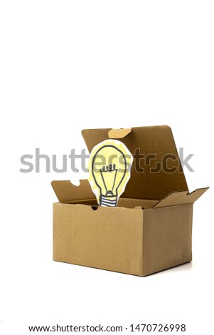 Light bulb inside a box over white background, think outside of the box, idea	