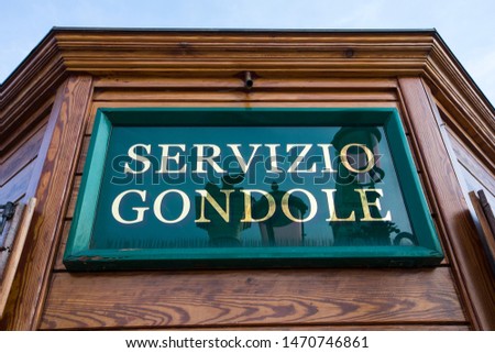 A Servizio Gondole sign on the main island of Venice, Italy.  These signs are where the tourists go when they want a Gondola ride.