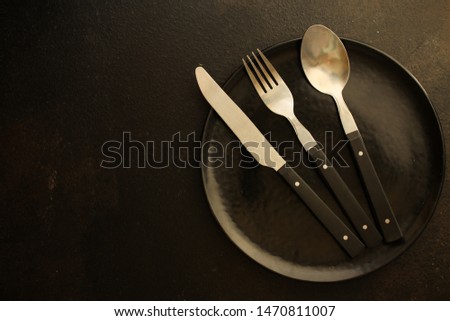 cutlery rustic, used for eating or serving (fork, knife, spoon, plate - set). food background. copy space