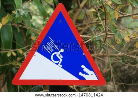 wheelchair warning sign for steep slope