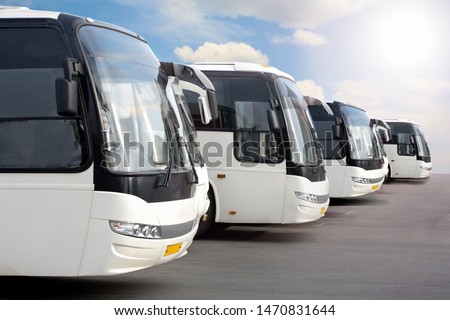 big tourist buses on parking Royalty-Free Stock Photo #1470831644