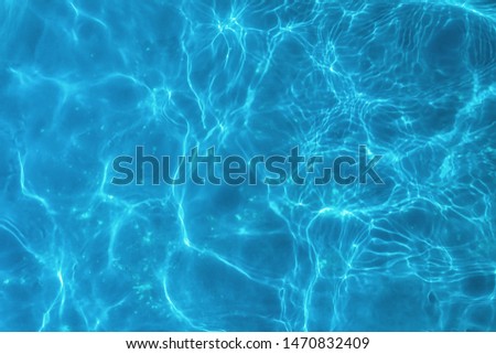 Top view swimming pool bottom water caustics background Royalty-Free Stock Photo #1470832409