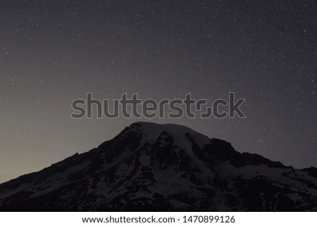 The Night Sky Above Mt Rainier In Washington State