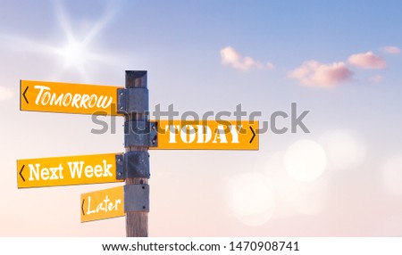 The Words Today, Tomorrow, Later and Next Week written on a Signpost Royalty-Free Stock Photo #1470908741