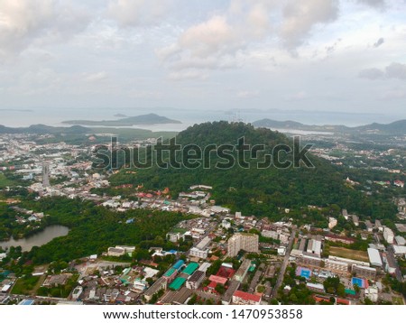 Views of old phuket town and Khaorang Hill in the middle of old phuket town also known as Khao Rang. Great views of the old city and surrounding hills in the distance phuket thailand 