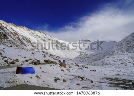 Snow on the top mountains at, Khardungla Pass road, the highest altitude road of India Landscape at the Khardungla pass, Leh Ladakh, Jammu and kashmir, India