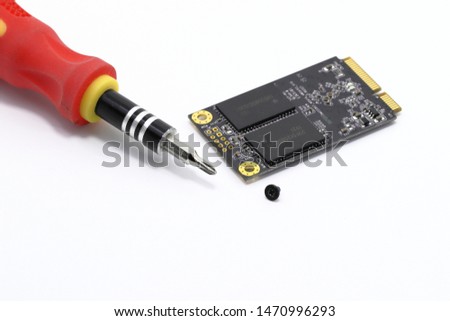 solid state drives msata for computer and tool for installation screw and screwdriver -  isolated on white background