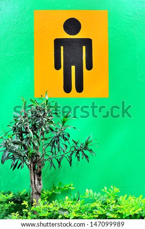 A man restroom sign in national park background