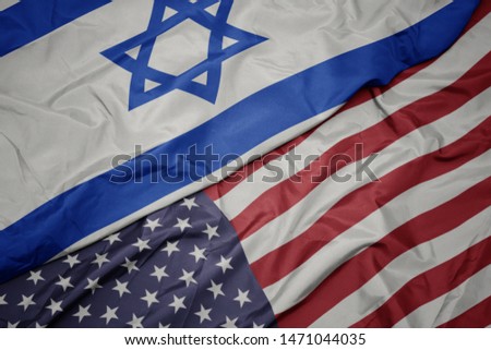 waving colorful flag of united states of america and national flag of israel. macro Royalty-Free Stock Photo #1471044035