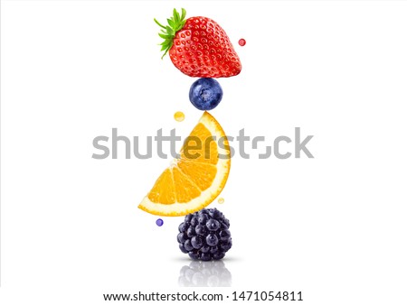 A stack of fresh ripe summer fruits and berries isolated on white background. Blackberry, orange, blueberry, strawberry fruit stack in a row. Healthy life, balanced diet composition design concept Royalty-Free Stock Photo #1471054811