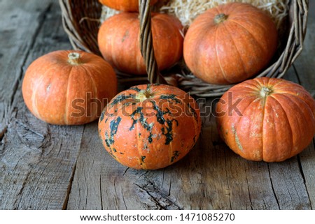 Pumpkins on a wooden table.