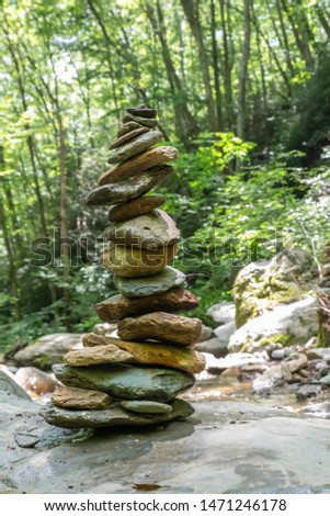 Meditative zen stone stack near a river in North Carolina, adjacent to Boone, Banner Elk, and Grandfather Mountain