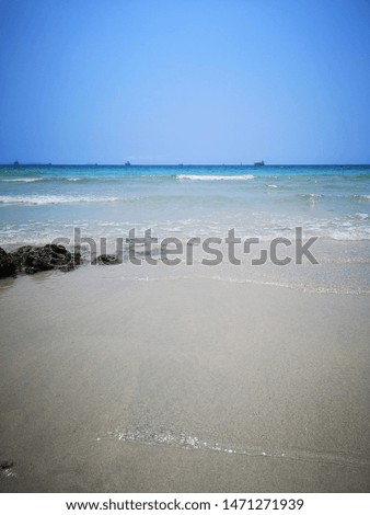 Clear sea water with the sky