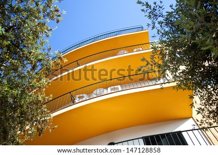 building with orange terraces, bottom view