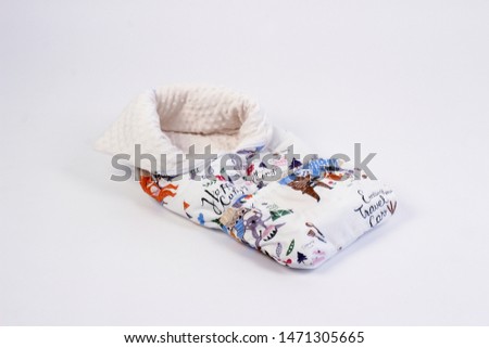 textiles for newborns, the side of the pillow in the baby bed, blankets, cocoons, etc.
