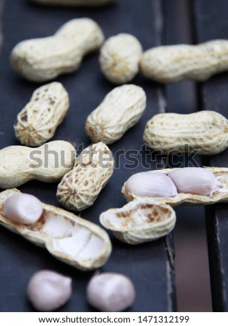 Close-up picture of peanuts, black background