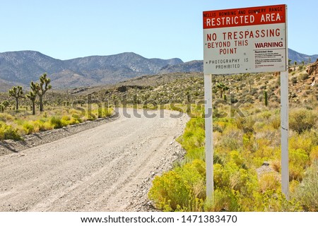The Signs at the entrance to Area 51, Groom Lake, Nevada Royalty-Free Stock Photo #1471383470