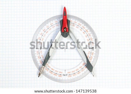 Tools for Plotting compass and protractor. On a white background.