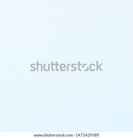 Photo of square format frame with filled plain pale blue colour for use as background, backdrop or template for card note poem or haiku or double exposure image with blank copyspace