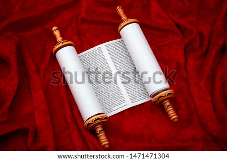 The Old Testament text, Jewish temple or synagogue, religious parchment scroll and the Judaic religion concept theme with the holy Torah open on red velvet background Royalty-Free Stock Photo #1471471304