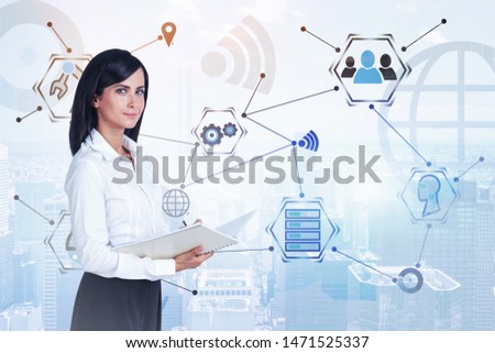 Smiling woman with notebook standing in city with double exposure of hi tech interface. Concept of technology in business. Toned image