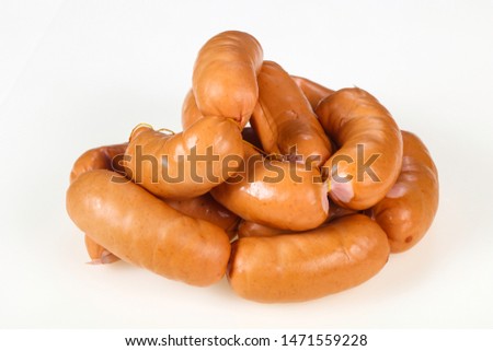 Tasty meat sausages ready for eat over white background