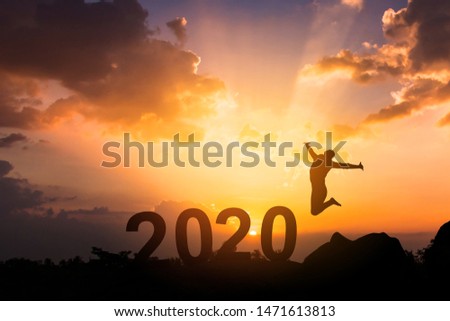  Happy New Year 2020, Silhouette young woman jumping to Happy new year concept.