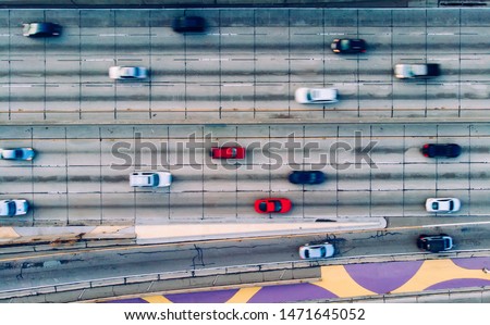 Aerial view of city landscape with autobahn motorway in metropolis, Bird's eye view. automobiles moving at street with modern automotive expressway. interchange road highway, junctions freeway Royalty-Free Stock Photo #1471645052